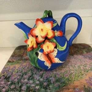 Pier One hand painted tea pot with flowers and butterflies.